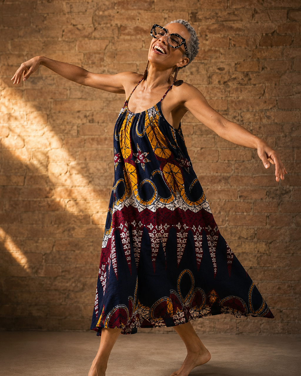 Bernadette Pleasant looking up, laughing, and dancing freely